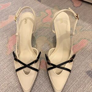 Zara Cream Pointed Slingback Heels with Black Cross-Straps and Gold Buckles